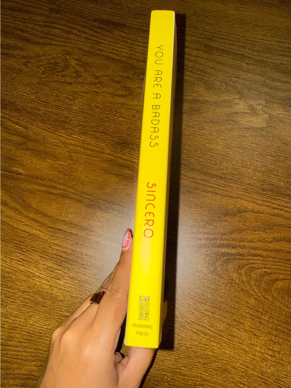 You Are a Badass by Jen Sincero - Yellow Paperback Self-Help Book
